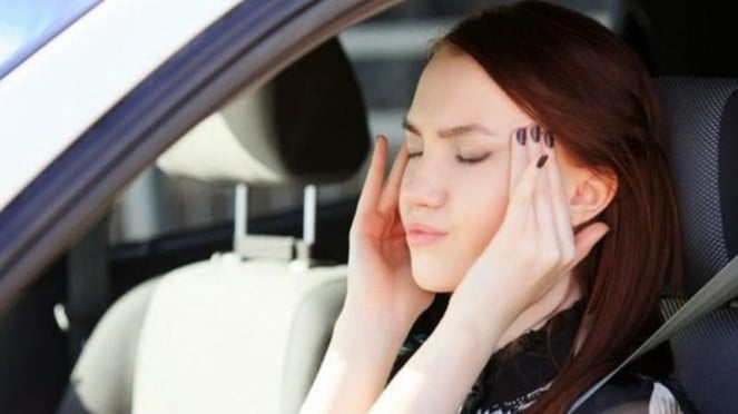 Ilustrasi pusing dan mual saat naik mobil.
