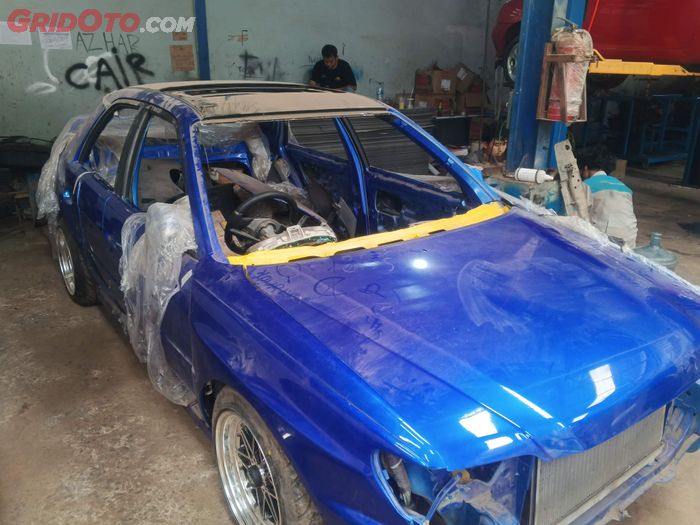 cat mobil, cat mobil bekas, dempul bodi mobil, Cat mobil berjamur, cat mobil bentol, Mobil Nggak Dempul Tapi Bergelombang Setelah Dicat? Ini Peyebabnya