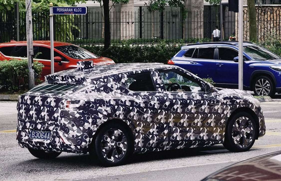 Perodua ‘QV-E’ EV spotted without rear wing, exposing sloping roofline, notched tailgate design, sporty profile